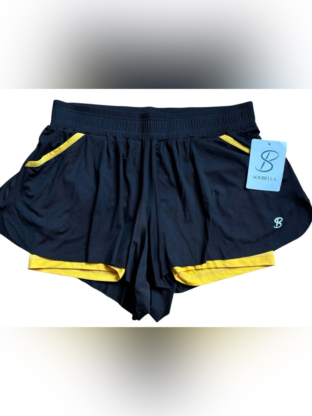 Women's Sofibella skirt in black and yellow. Matching tops sold separately